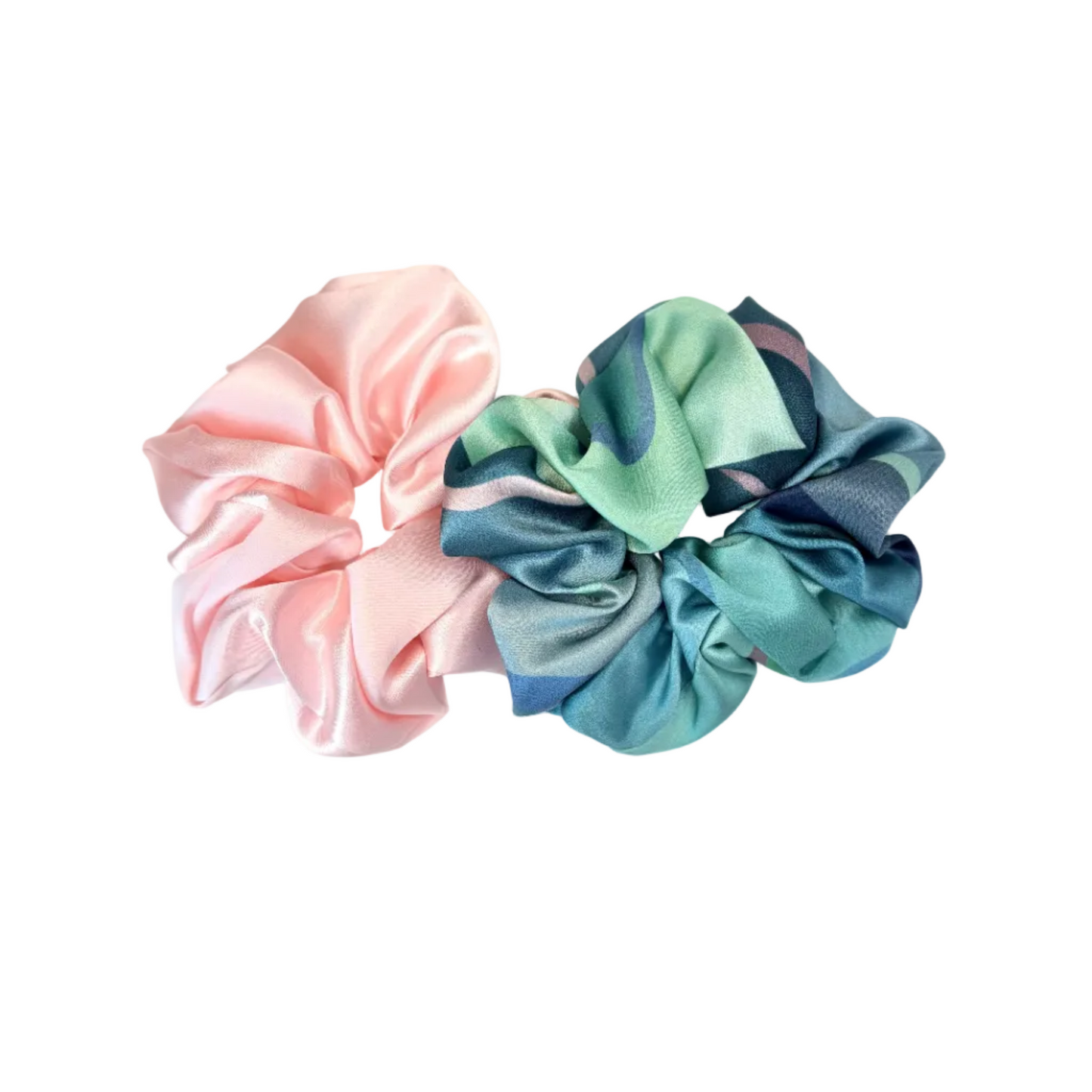 Two satin scrunchies, one pink and one multicolored, on a white background.