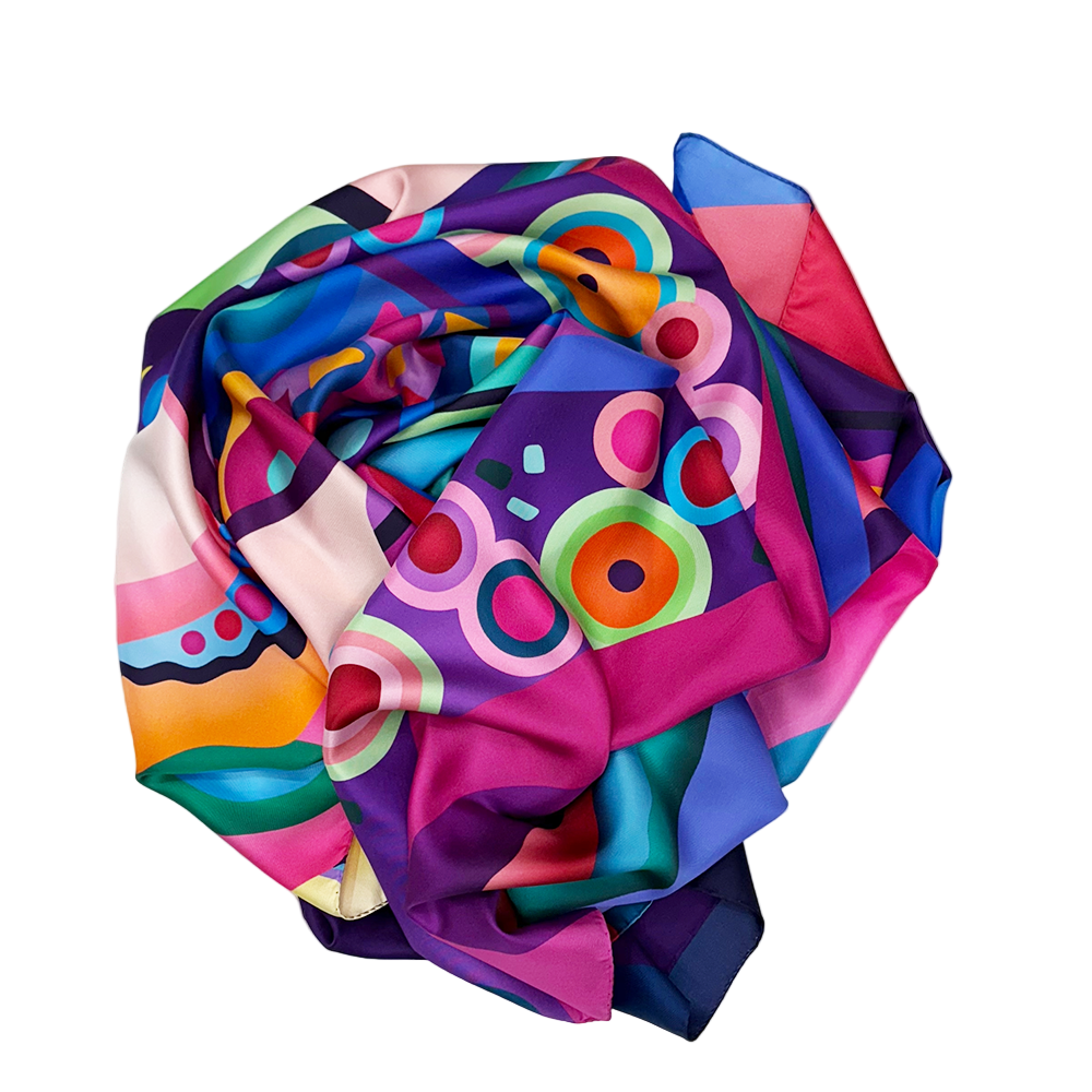 Colorful abstract patterned scarf on a white background