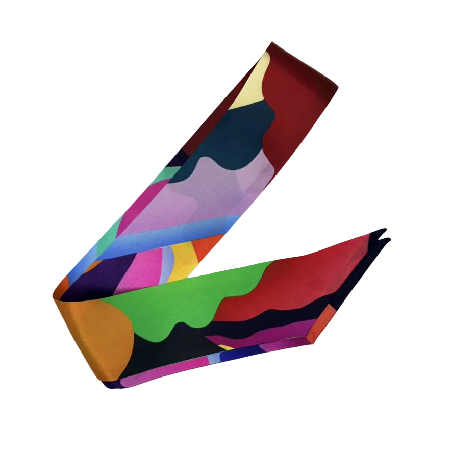 Colorful abstract patterned headband on a white background