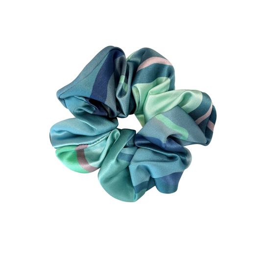 Multicolored striped scrunchie on a white background