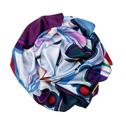 Colorful silk scarf with abstract pattern on a white background