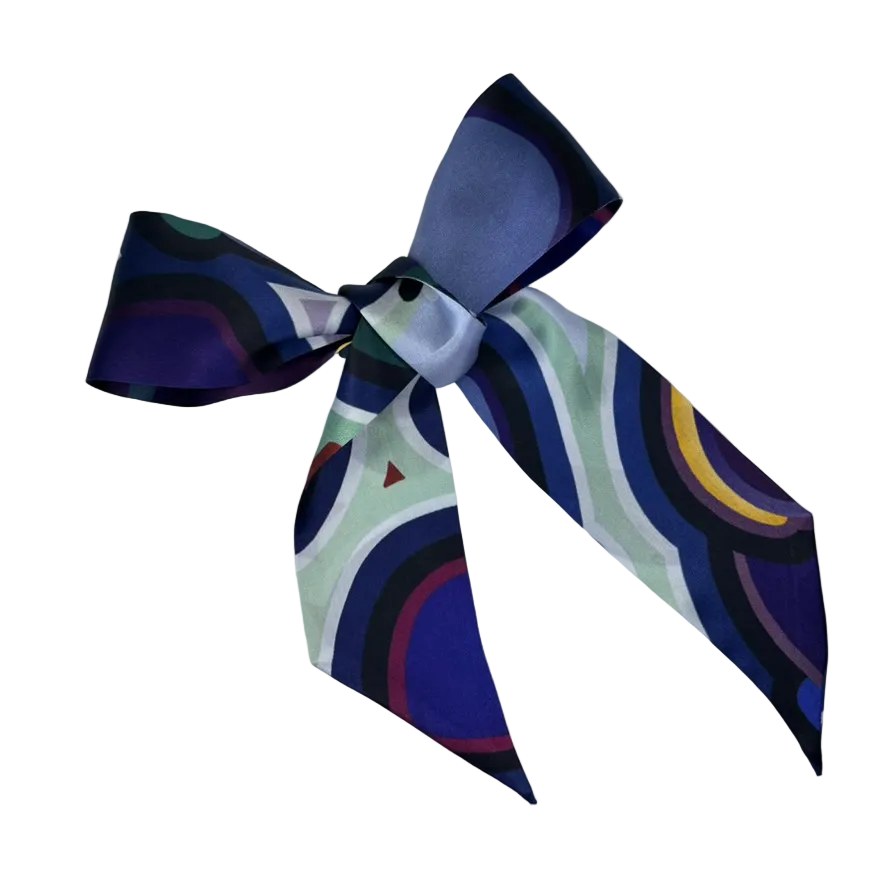 Colorful bow with geometric pattern on a white background